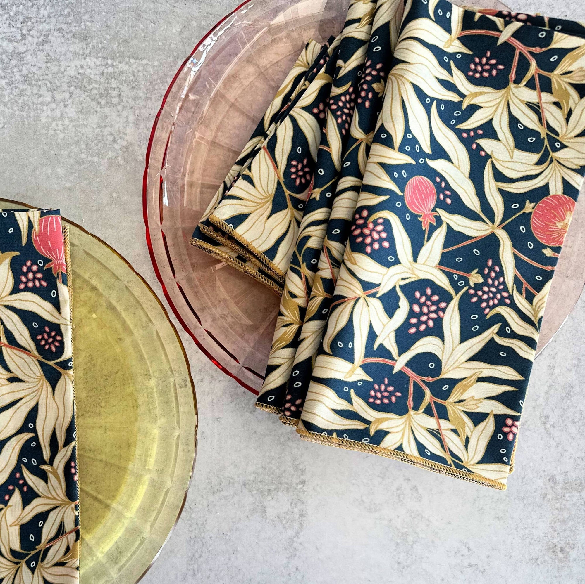 Patterned floral napkins on a textured surface