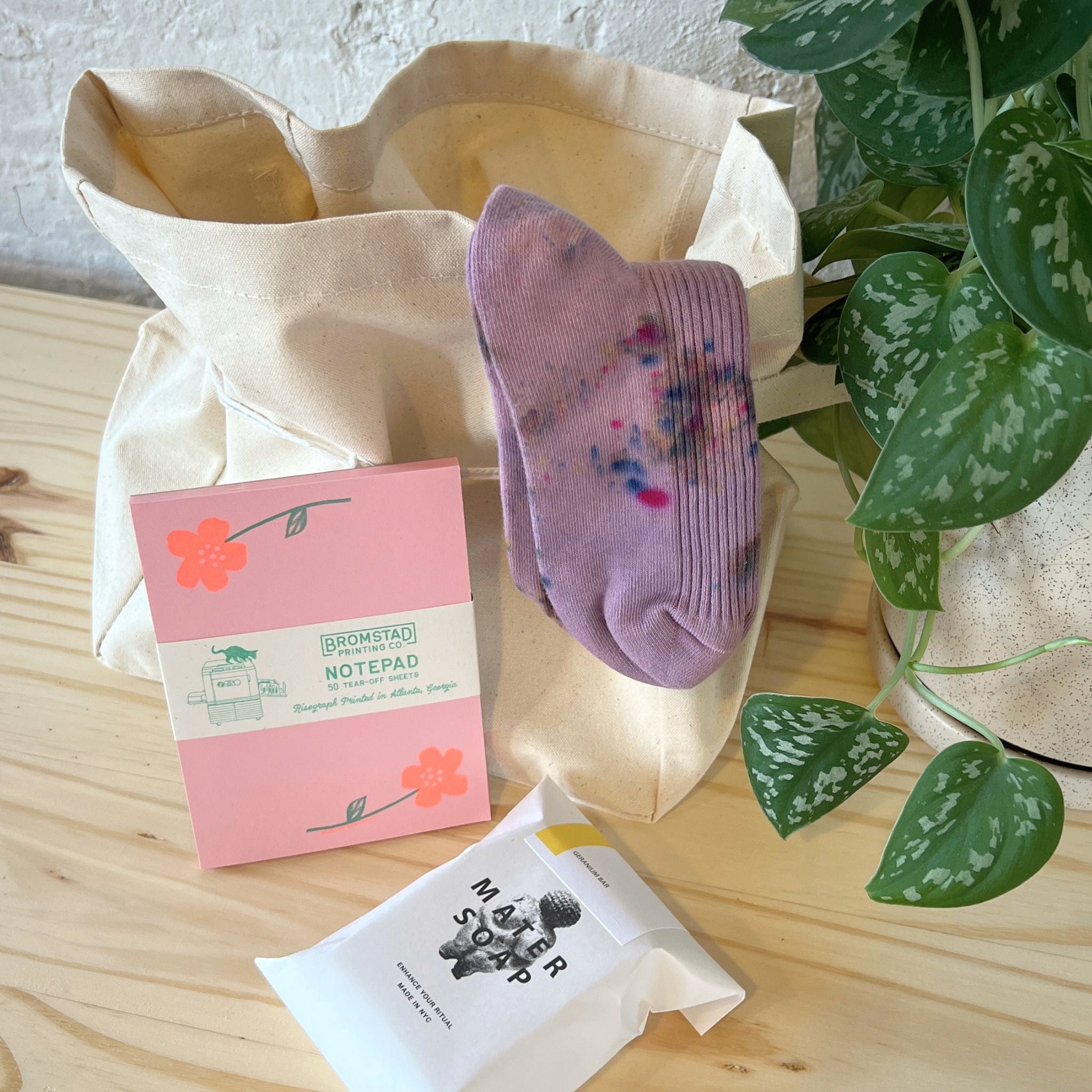 In Bloom Floral Gift Set with Mater Soap Geranium Bar, Merle Works Hand-Dyed Socks, Bromstad Printing Risograph Notepad and Canvas Bucket Tote
