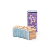 Wooden letter blocks with a purple box labeled clay stamps on a white background
