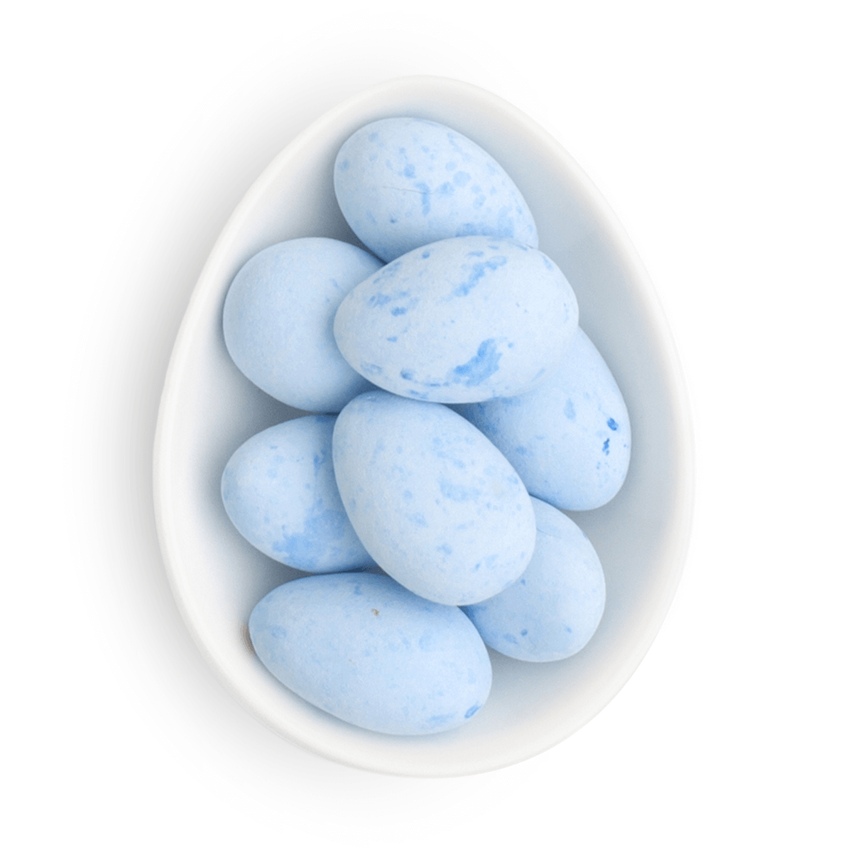 White bowl filled with light blue speckled candies on a white background