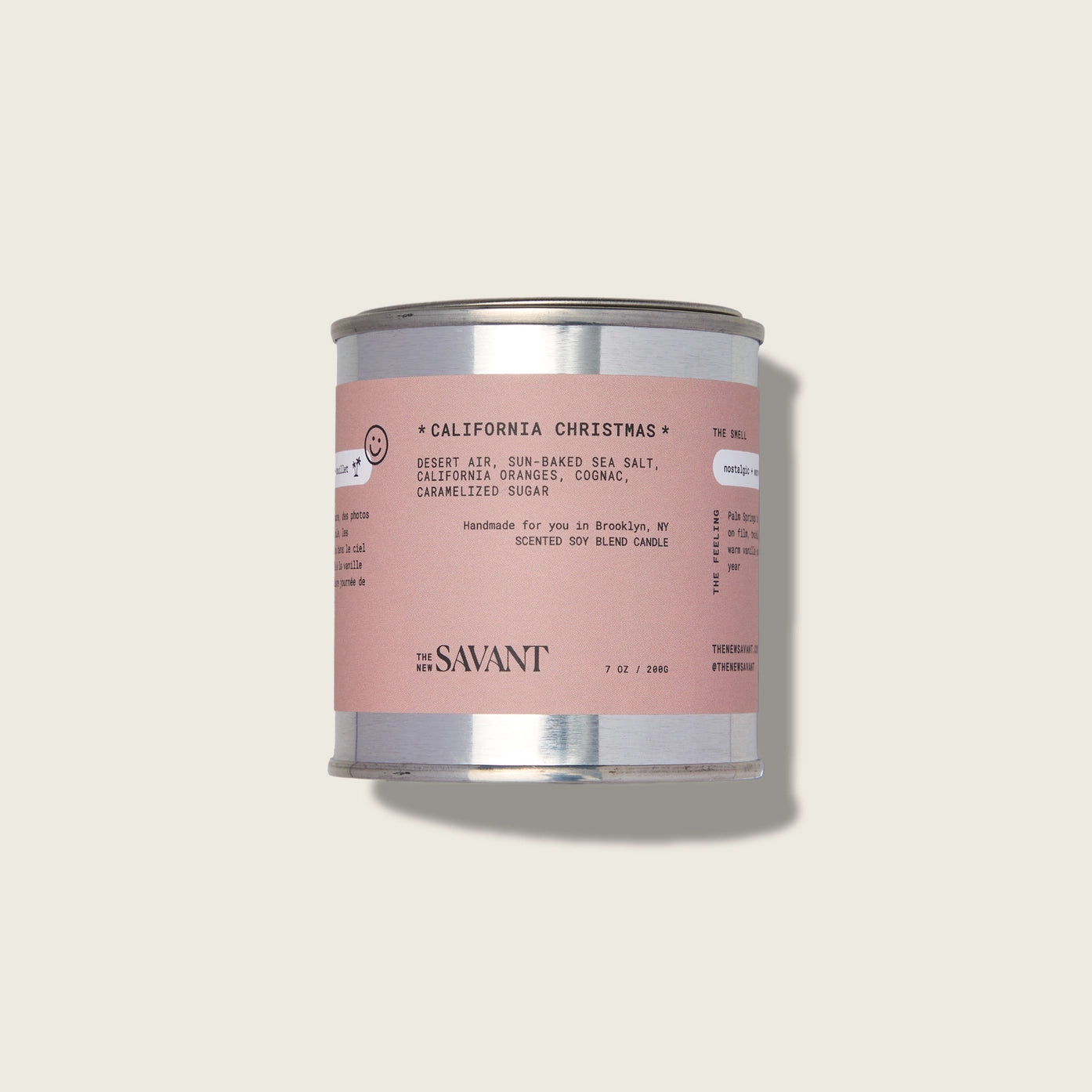 The New Savant candle in a pink can with a white background