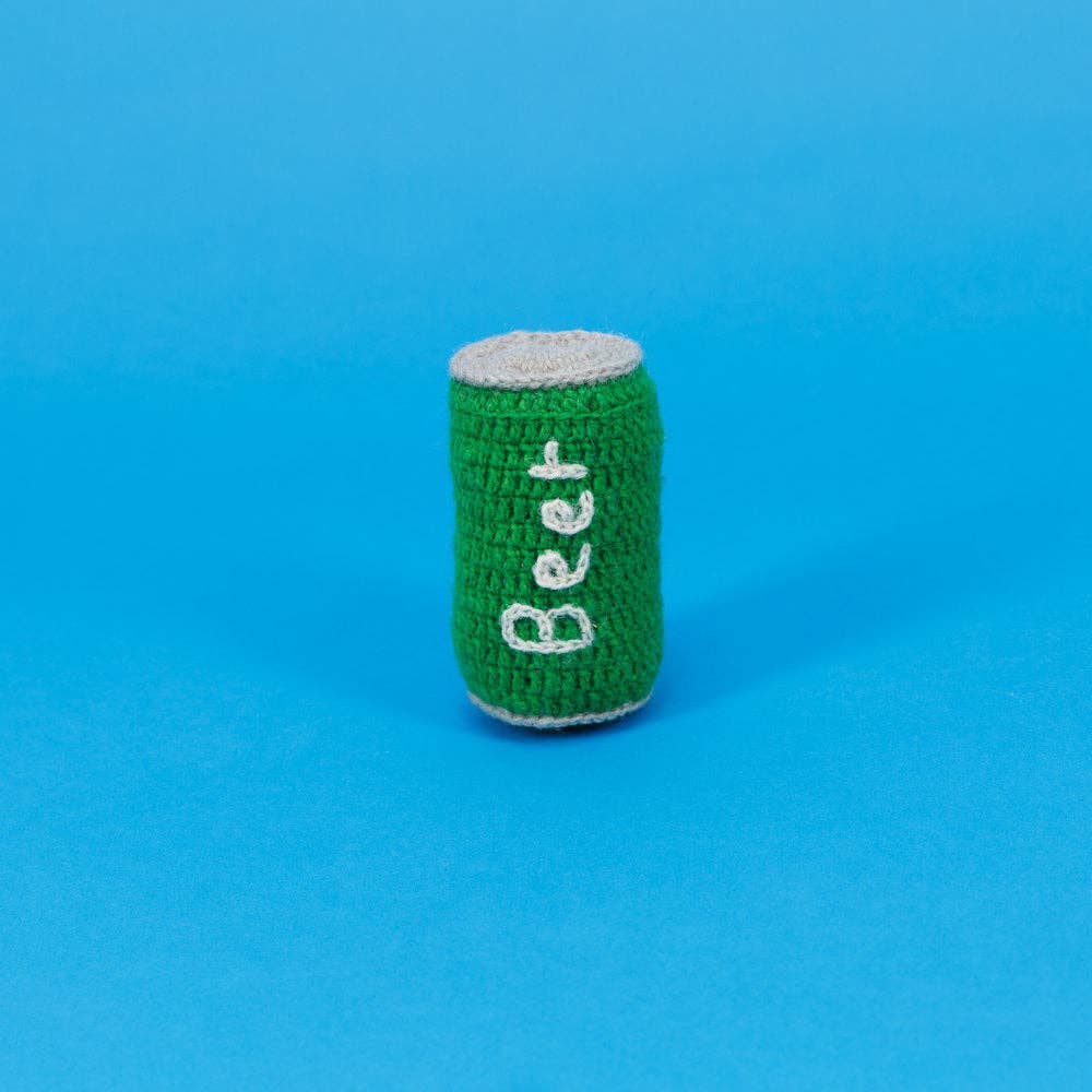 Green knit can with 'Beer' text on a blue background