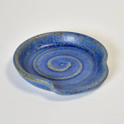 Blue ceramic dish on a white background